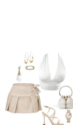 Flat lay of a white halter top, pleated mini skirt, and accessories