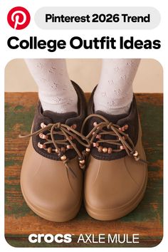 Close up of Crocs Axle Mule shoes with white patterned socks on a wooden surface