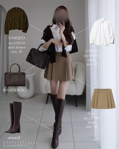 Woman in a white shirt, pleated skirt, and knee-high boots holding a handbag