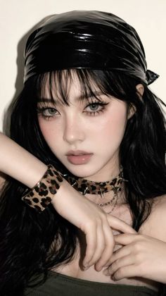 Woman with black hair and leopard print accessories