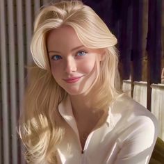 Blonde woman with blue eyes and freckles wearing a white shirt