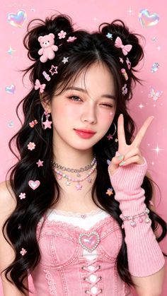 Woman with space buns and pink accessories winking and making a peace sign