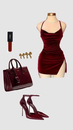 Collection of red fashion accessories and a velvet dress on a mannequin