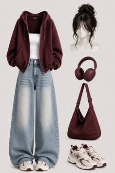 Full body outfit with a maroon hoodie, wide leg jeans, and accessories