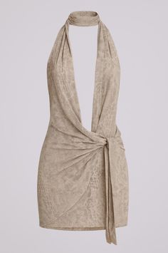 Beige halter neck mini dress with a deep V-neck and knot detail