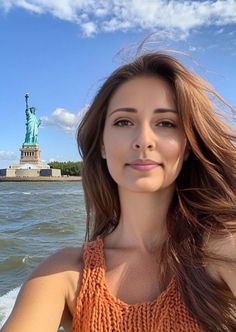 Woman on a boat with the Statue of Liberty in the background