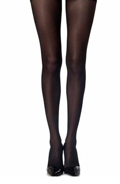 Person wearing black tights and high heels on a white background