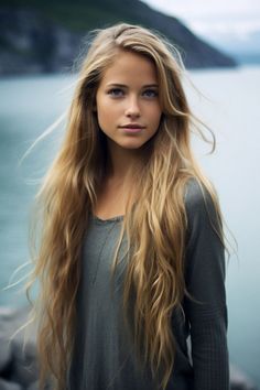 Young woman with long blonde hair and blue eyes outdoors