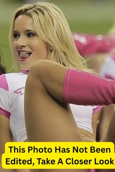 Blonde woman in a pink and white uniform smiling outdoors