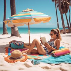 Woman in a bikini reading a book on a sunny beach with palm trees