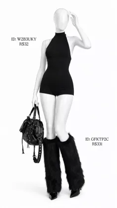 Mannequin wearing a black bodysuit, fur leg warmers, and holding a black handbag