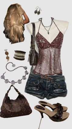 Flat lay of a sequined top, denim shorts, and accessories