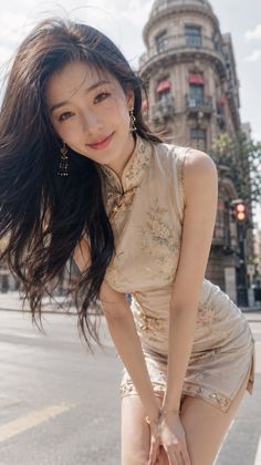 Woman in a floral cheongsam posing on a city street