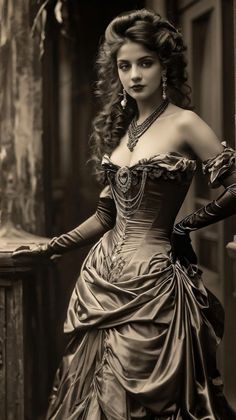 Woman in a Victorian-style dress with elaborate jewelry and gloves