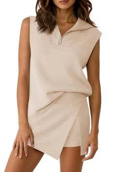 Woman in a beige sleeveless top and matching mini skirt