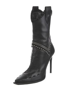 Black leather cowboy boots with high heels and studded details