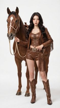 Woman in a brown cowgirl outfit posing with a horse on a white background