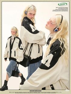 Blonde woman in a varsity jacket and denim skirt with headphones in a studio