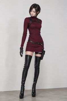 Woman in a red turtleneck dress with leather harness and thigh-high boots