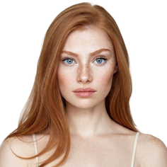 Woman with red hair, blue eyes, and freckles looking directly at the viewer