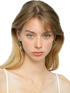 Young woman with blonde hair and blue eyes wearing jewelry