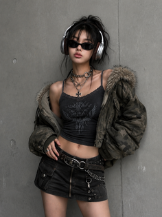 Woman in a crop top and mini skirt with headphones and sunglasses