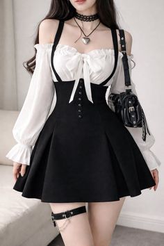 Woman in a black dress with white blouse and garter belt
