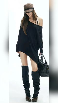 Woman in an off-shoulder top, hat, and boots holding a handbag