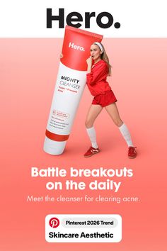 Woman in a red athletic outfit holding a large skincare product tube