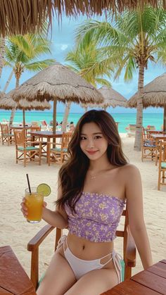 Woman in a bikini holding a cocktail on a tropical beach