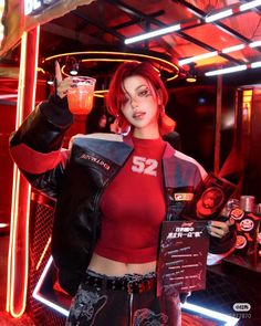 Woman with red hair in a cropped top and leather jacket under neon lights
