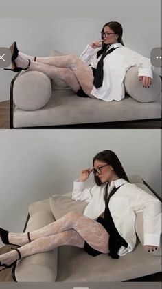 Woman in a white shirt, black tie, and white lace tights posing on a couch