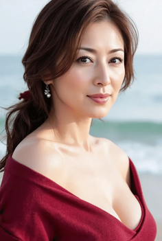 Woman with long brown hair wearing a red top with cleavage at the beach