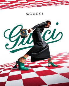 Woman in a black dress and green heels walking on a red and white checkered floor