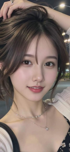 Woman with brown hair and jewelry in a night setting