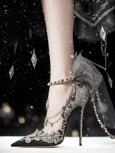 Elegant high heel shoe with intricate silver and crystal embellishments