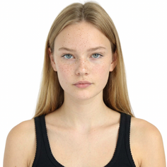 Young woman with blonde hair and freckles wearing a black tank top