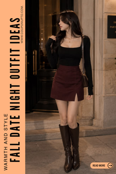Woman in a black long sleeve top and burgundy mini skirt with knee-high boots