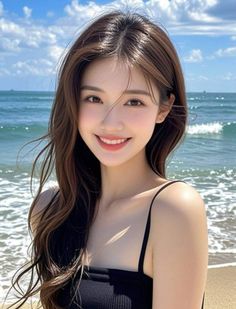 Smiling woman with long brown hair on a sunny beach