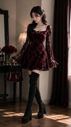 Woman in a red dress and thigh-high boots holding a handbag indoors