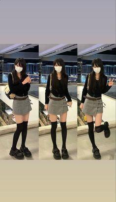 Woman in a black cardigan and mini skirt posing indoors
