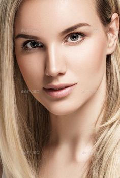 Close up portrait of a woman with blonde hair and soft lighting