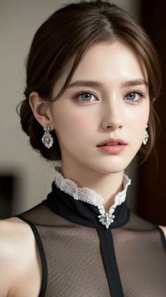 Woman with blue eyes and an updo wearing a black top with a lace collar