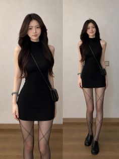 Woman in a black dress and patterned tights standing indoors