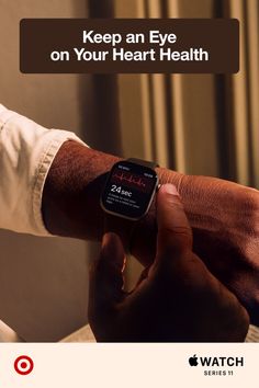 Close up of a person's arm wearing a smartwatch displaying heart rate data