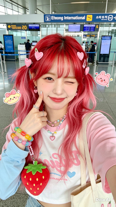 Woman with red and pink pigtails winking at an airport