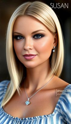Blonde woman with blue eyes wearing a striped top and jewelry