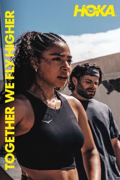 Two athletes, a woman in a sports bra and a man in a t-shirt, outdoors