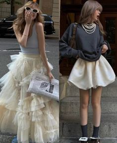 Two women in different outfits, one in a ruffled skirt and the other in a short skirt