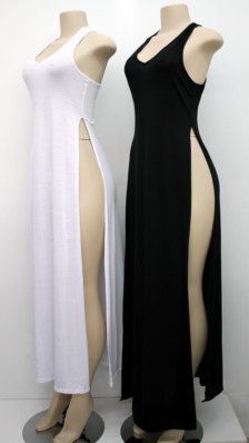 Two mannequins wearing long dresses with high side slits
